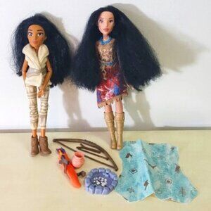 Two Disney Pocahontas dolls with Indian accessories
